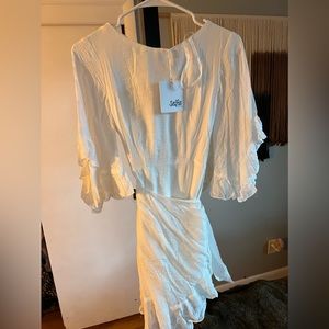 Selfie Lesli white wrap dress. Brand new with tags.